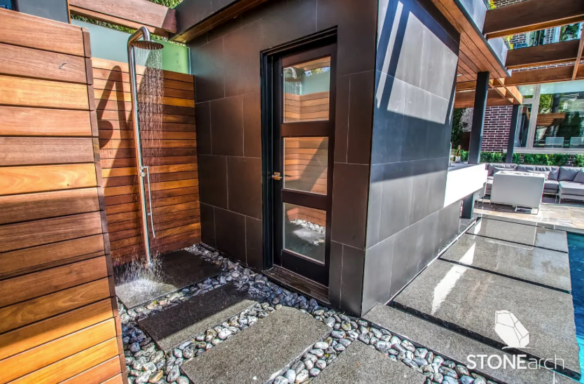 Pebbles - Black Granite/Basalt - Polished - 1-1/4"-2"( 1 Ton Bag)